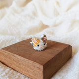 Calico Cat Ring in Orange and Brown Display Left