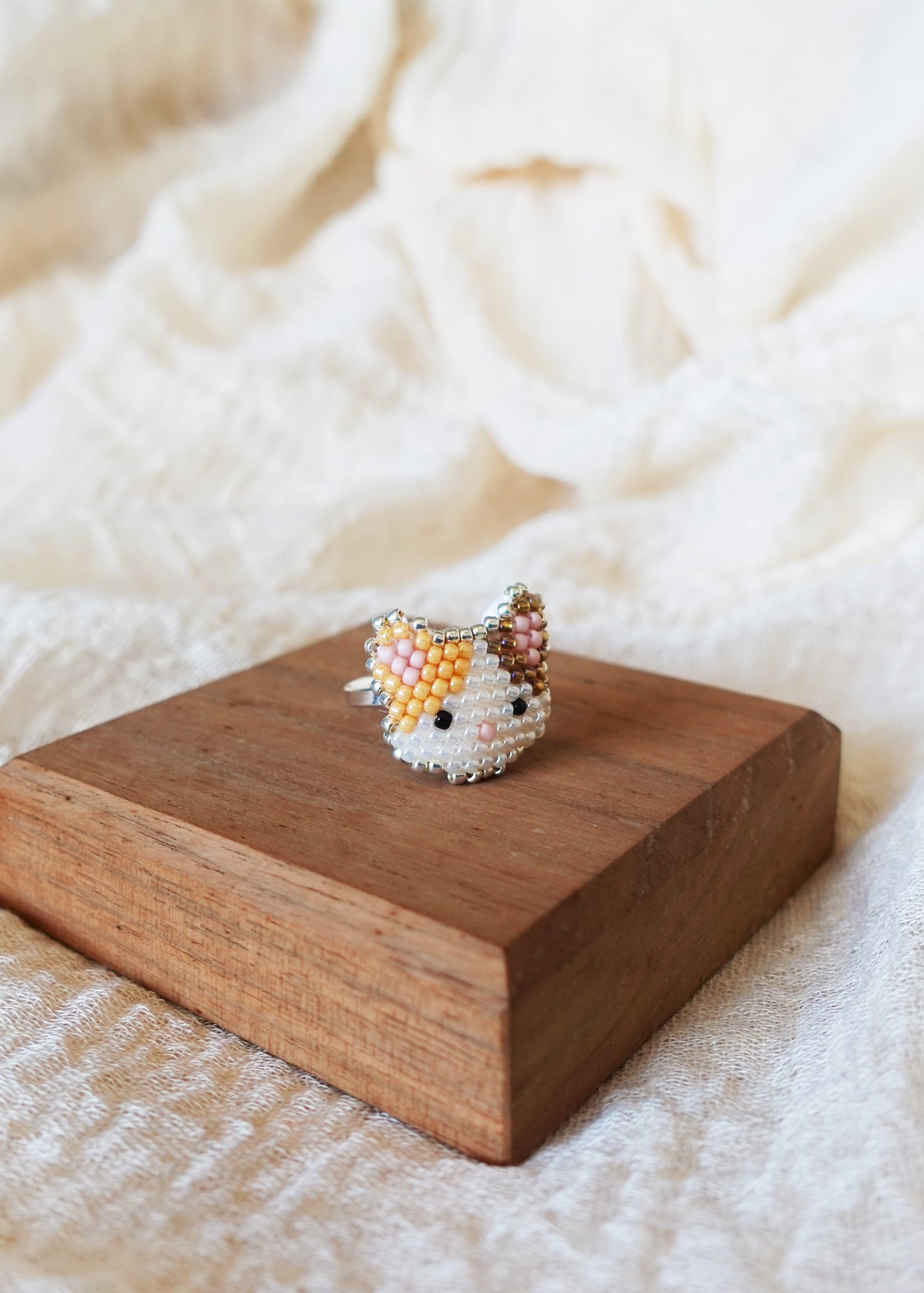 Calico Cat Ring in Orange and Brown Display Left