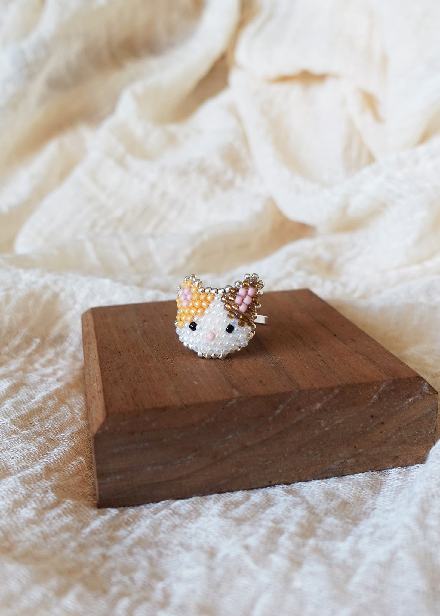 Calico Cat Ring in Orange and Brown Display Right