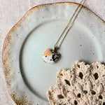 Calico cat necklace right