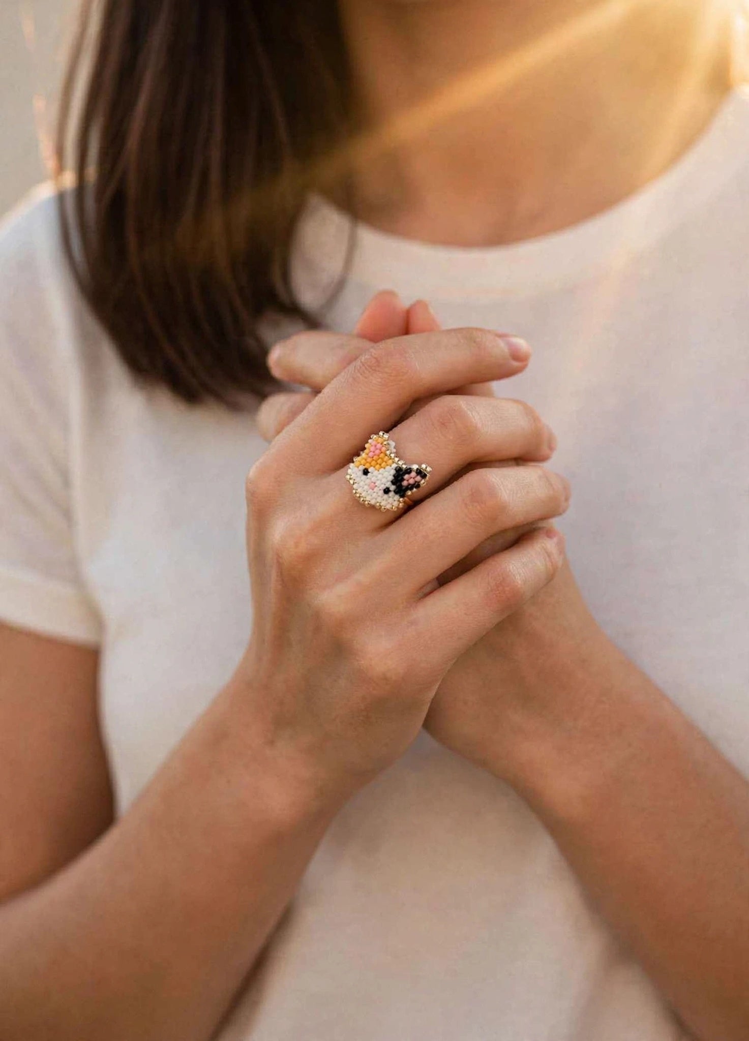 Calico cat ring on model