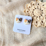 Calico cat stud earrings on card