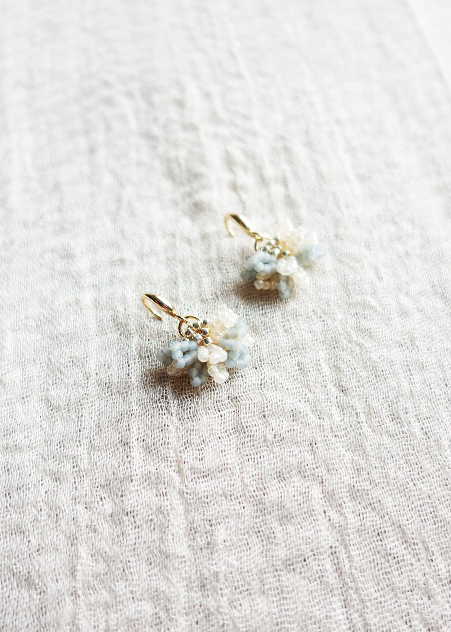 Camellia Bicolor Drop Earrings in Smoke Grey Left Bottom