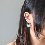 Camellia Bicolor Drop Earrings in Smoke Grey Model