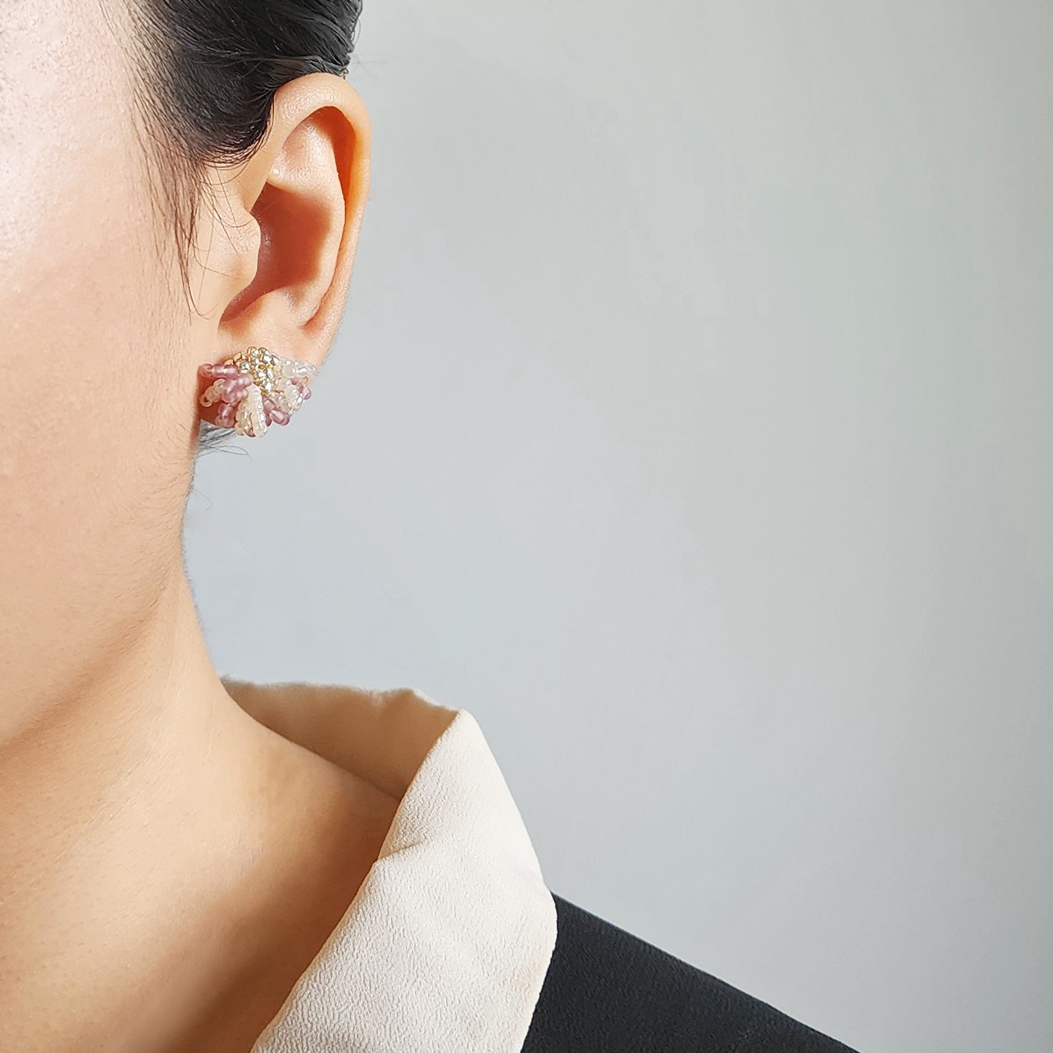 Camellia Bicolor Stud Earrings in Mauve Purple Model
