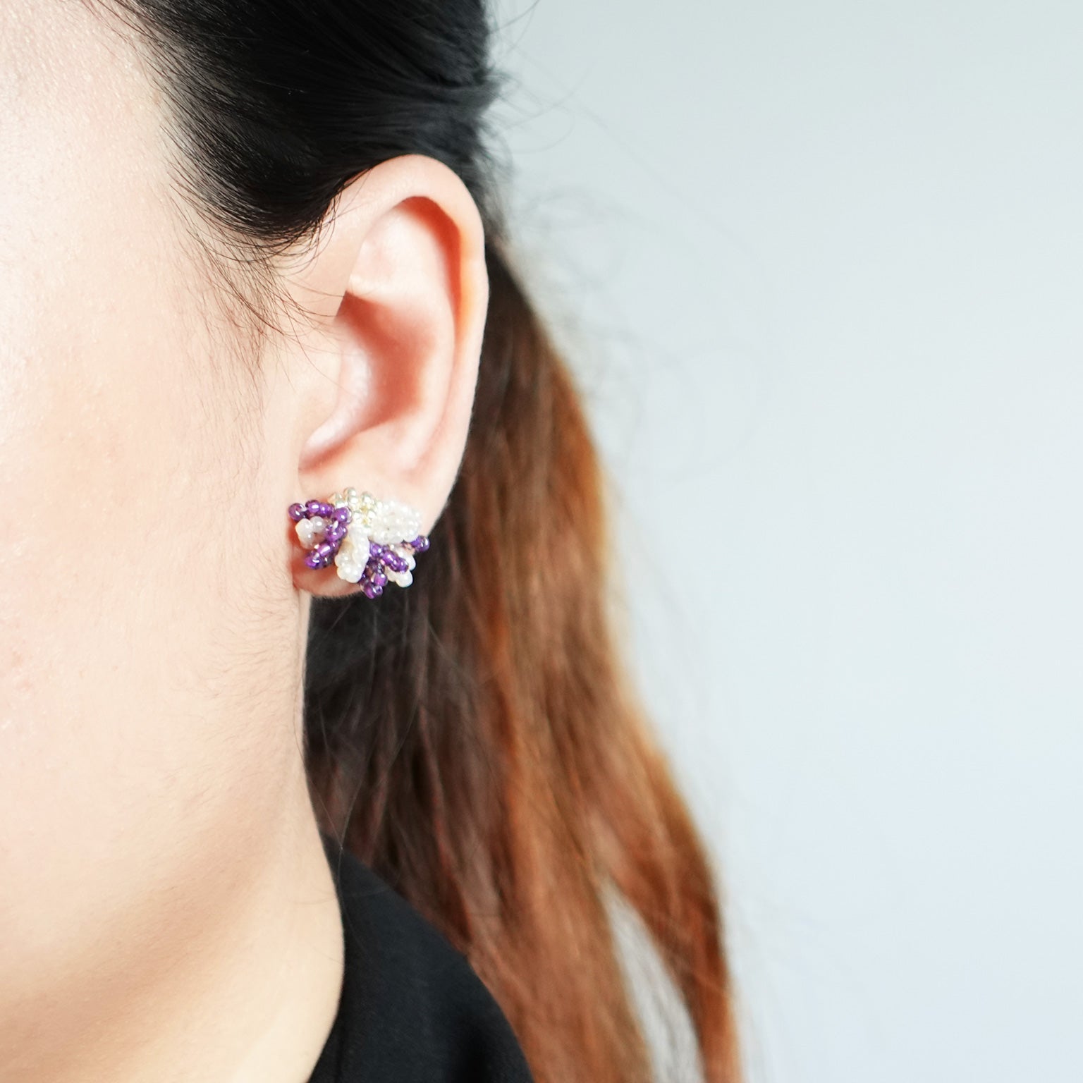 Camellia Bicolor Stud Earrings in Royal Purple Model
