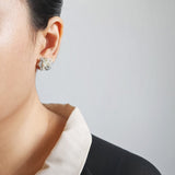 Camellia Bicolor Stud Earrings in Smoke Grey Model
