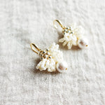Camellia Clo Snowball Dangle Earrings Left Close
