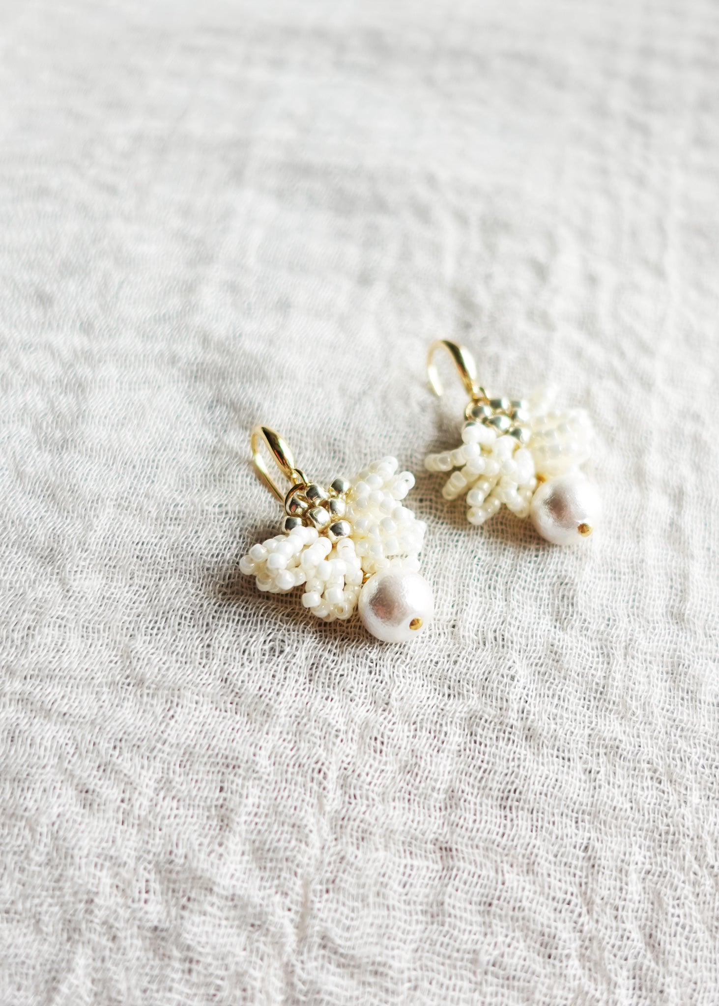 Camellia Clo Snowball Dangle Earrings Left Top Close