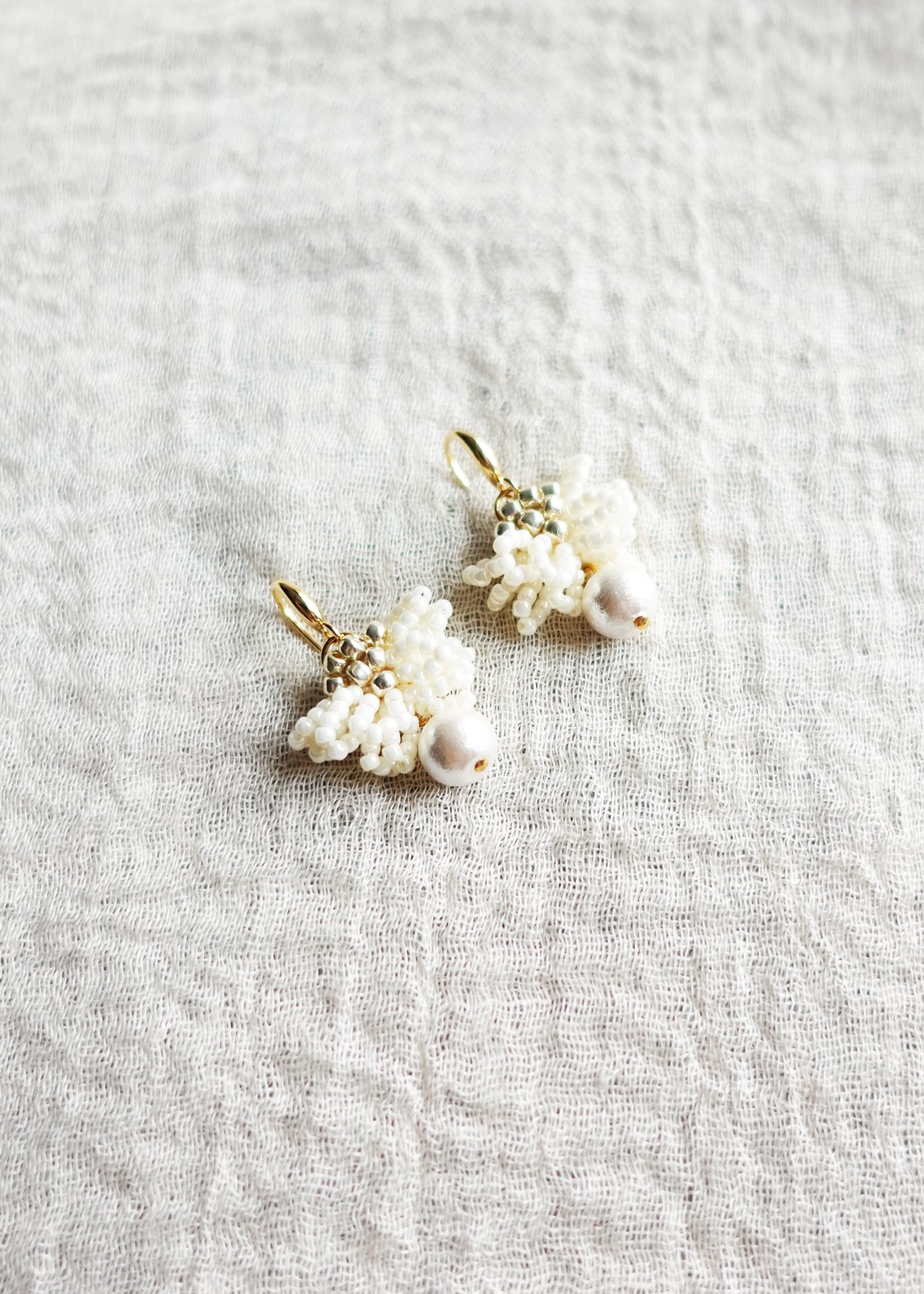 Camellia Clo Snowball Dangle Earrings Left Top