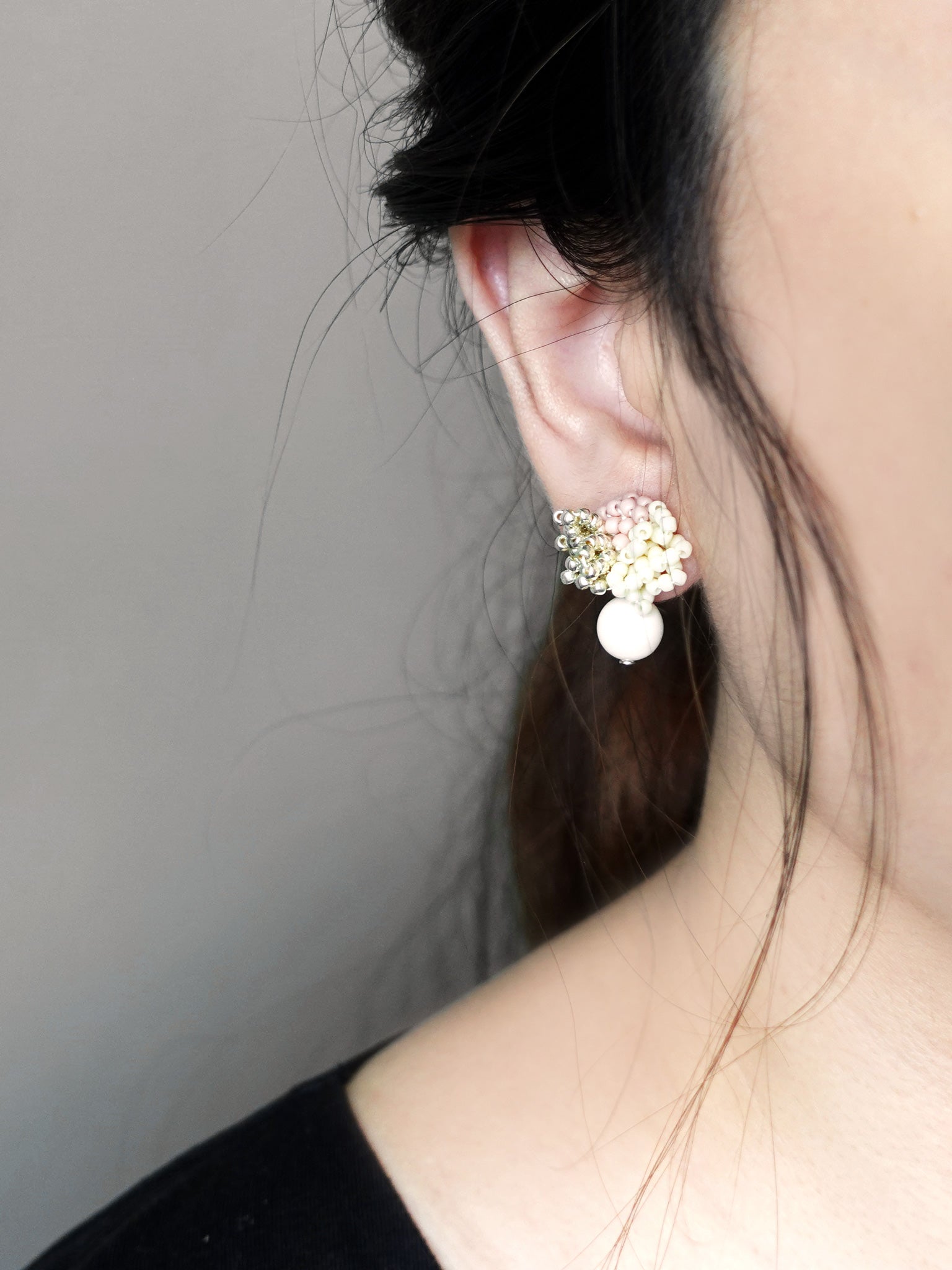 Camellia Cream Drop Earrings in Pale Pink Model