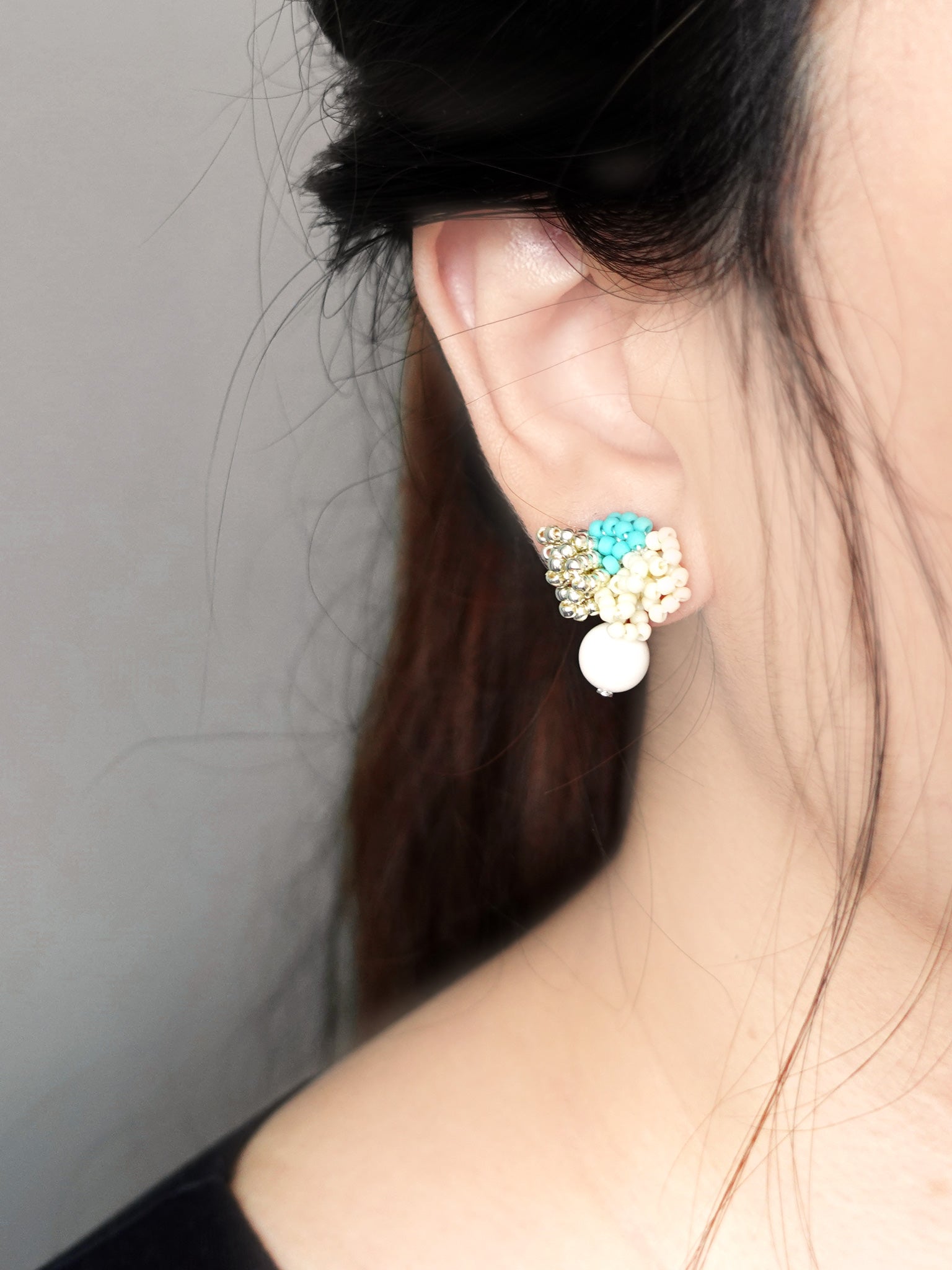 Camellia Cream Drop Earrings in Turquoise Model