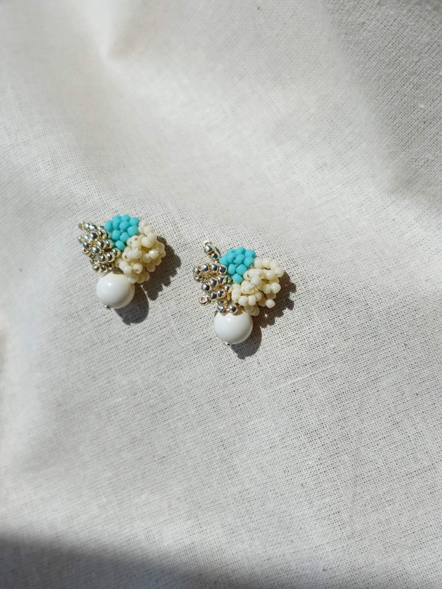 Camellia Cream Drop Earrings in Turquoise Side