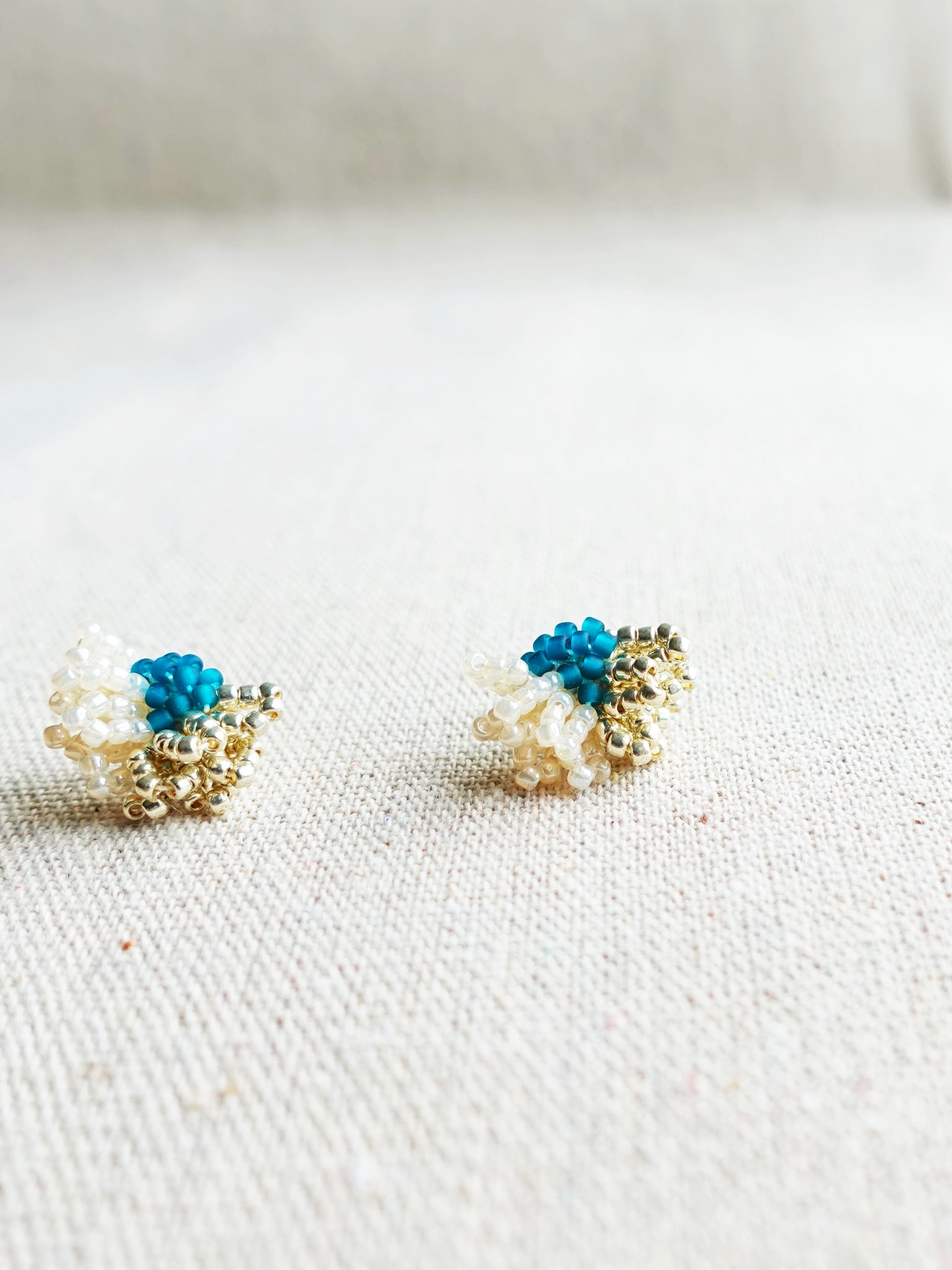 Camellia Dip Stud Earrings in Teal Front