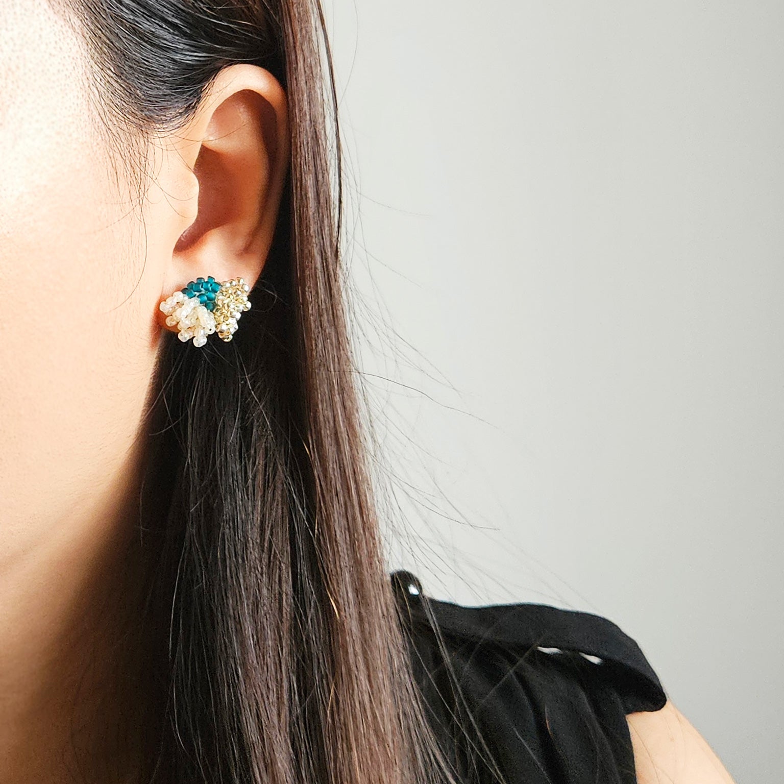 Camellia Dip Stud Earrings in Teal Model