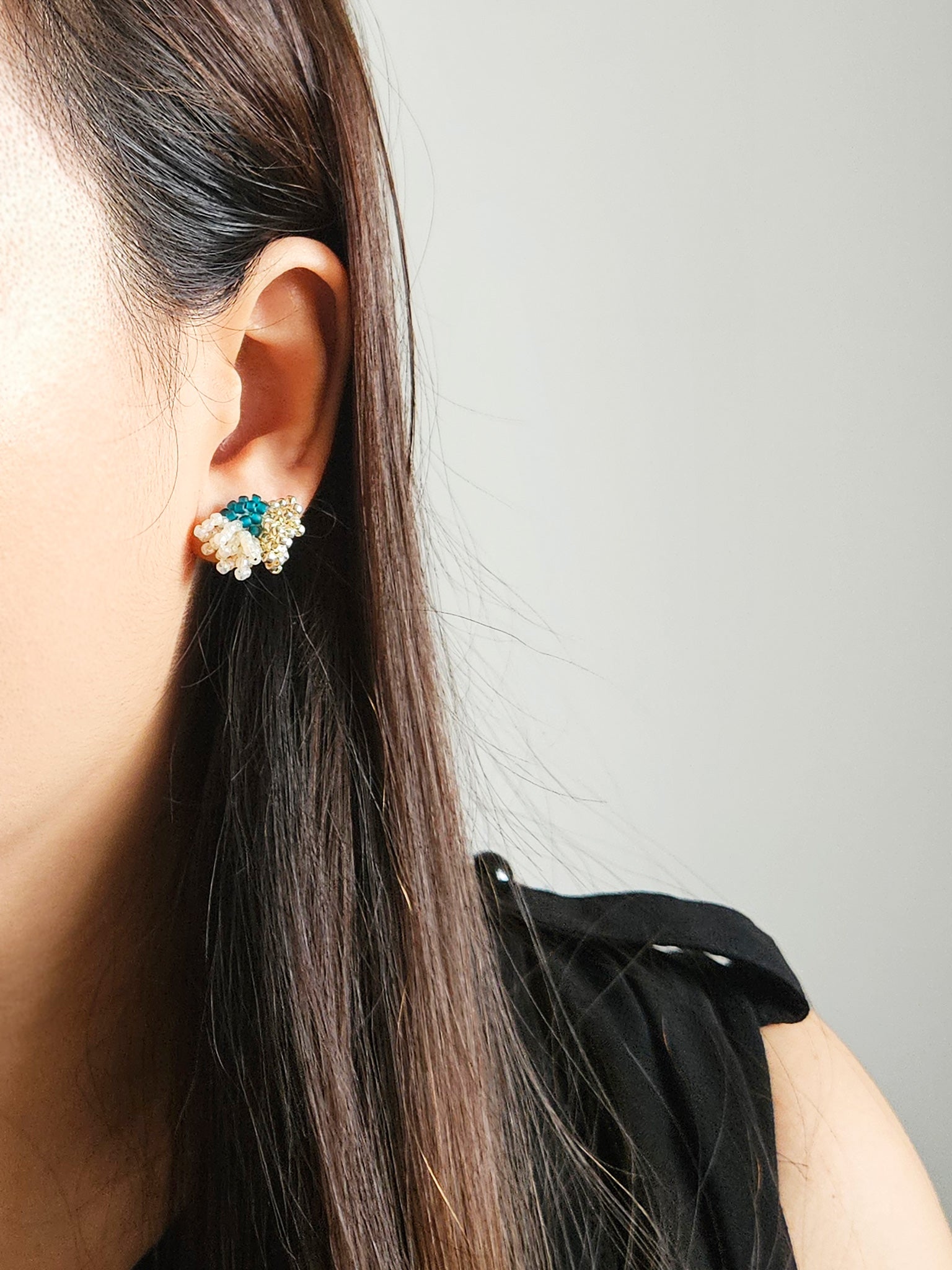 Camellia Dip Stud Earrings in Teal Model