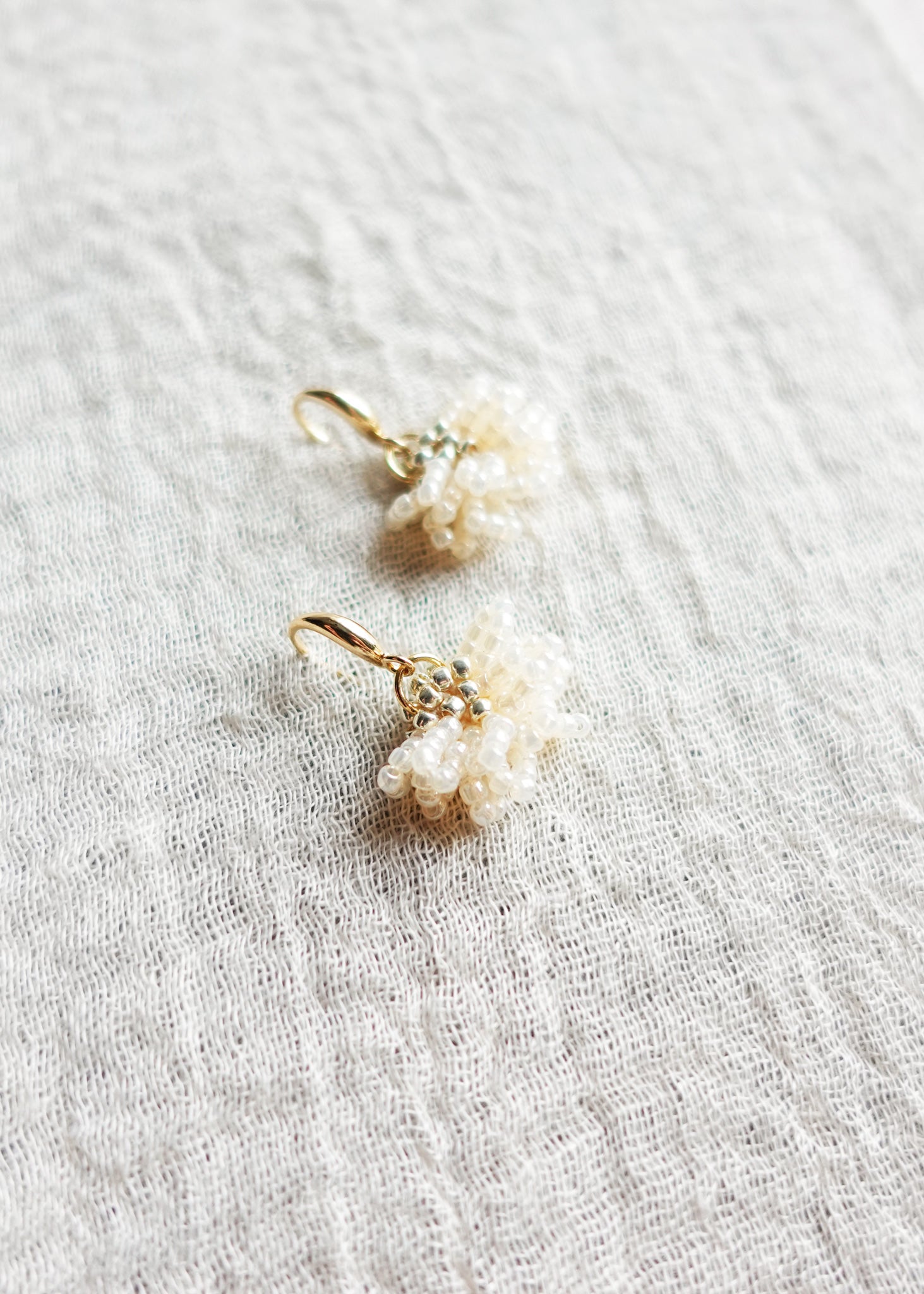 Camellia Drop Earrings in Ivory Left Side