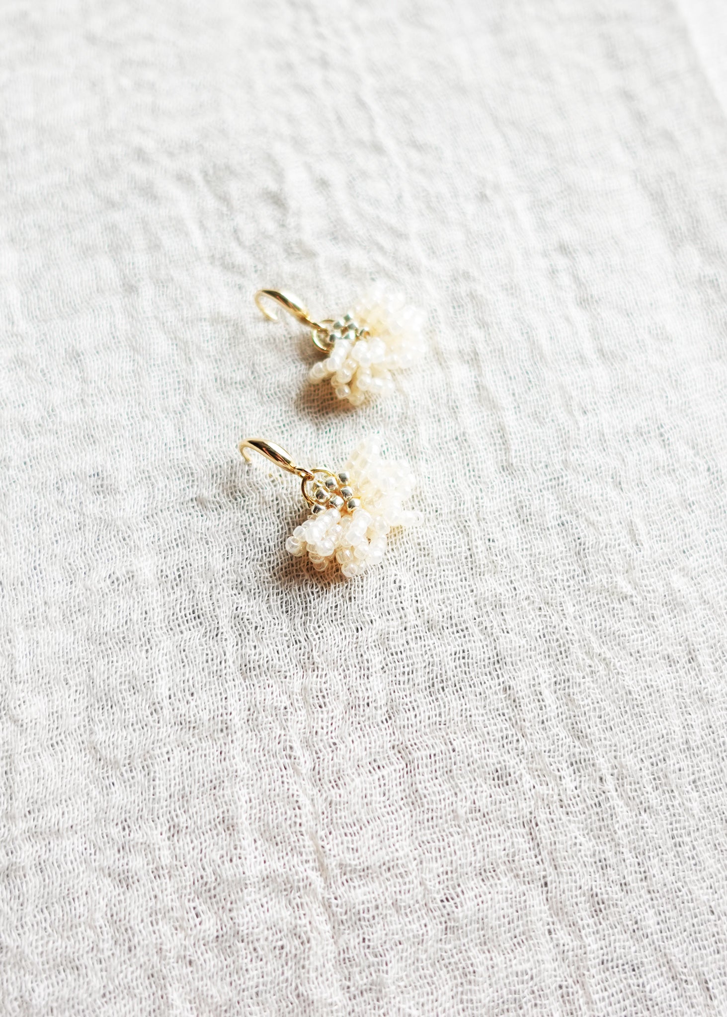 Camellia Drop Earrings in Ivory Left