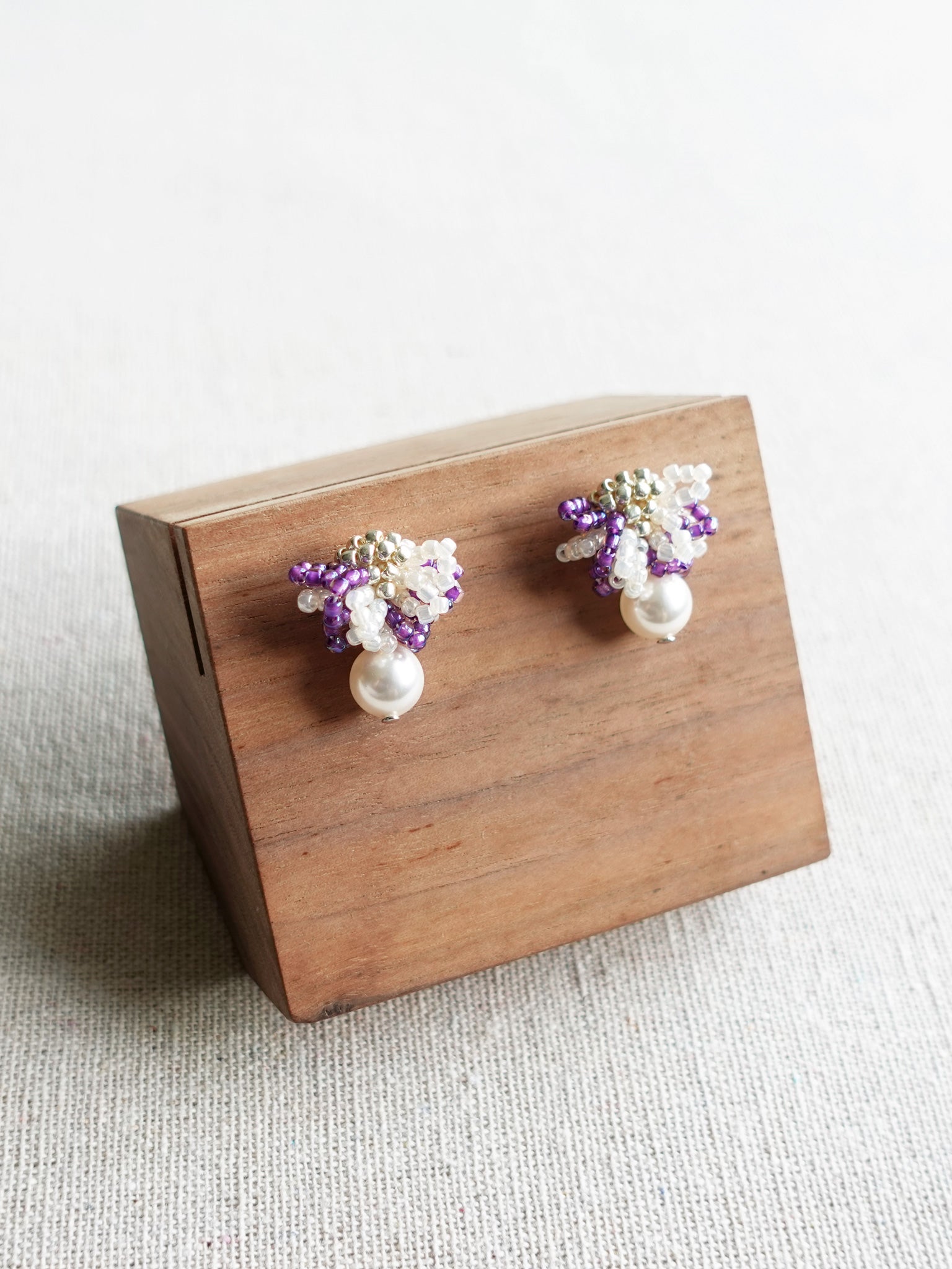 Camellia Mariota Bicolor Earrings in Royal Purple Display Left