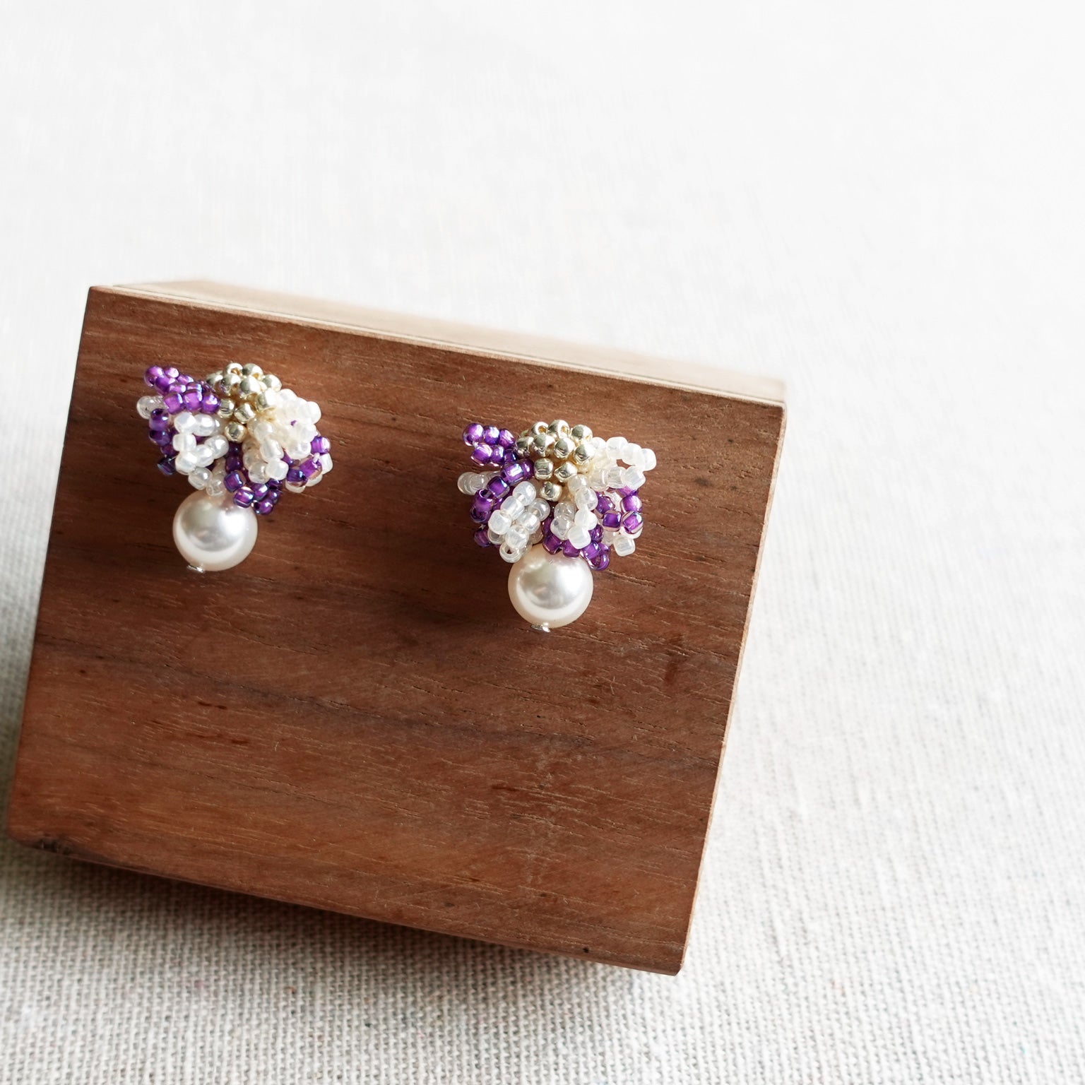  Camellia Mariota Bicolor Earrings in Royal Purple Display Right