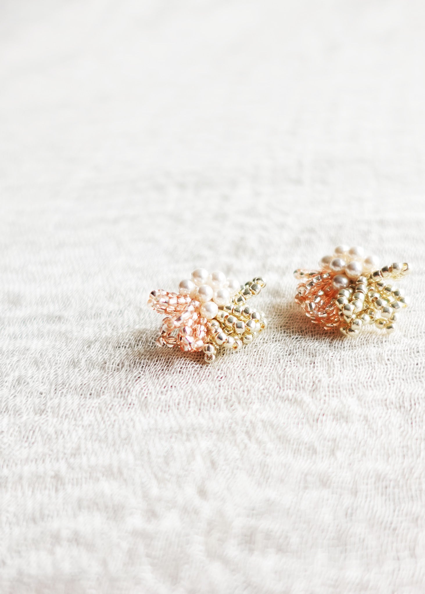 Camellia Pearl Dip Earrings in Champagne Pink Left
