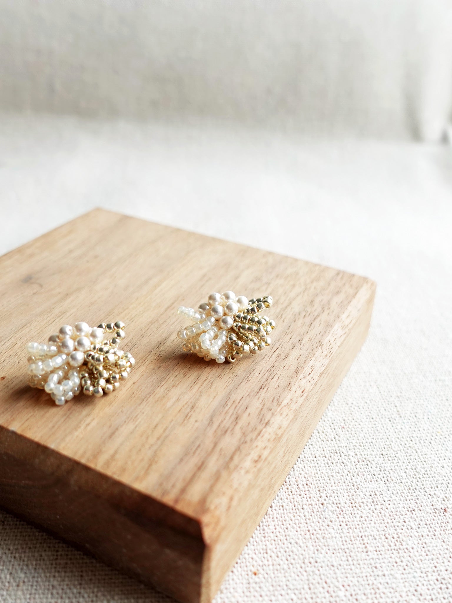 Camellia Pearl Dip Earrings in Ivory Display