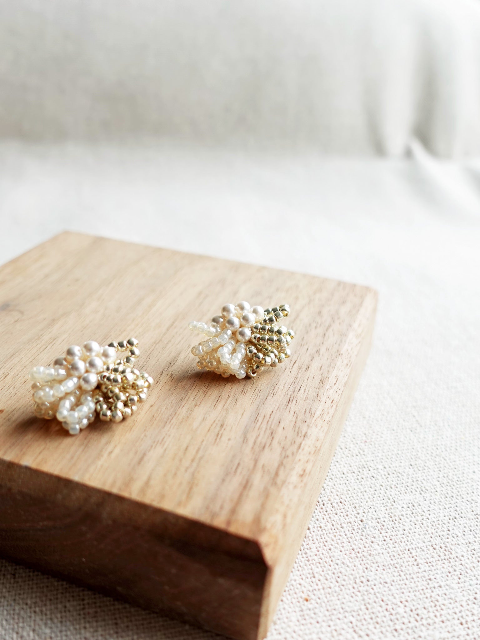 Camellia Pearl Dip Earrings in Ivory Display