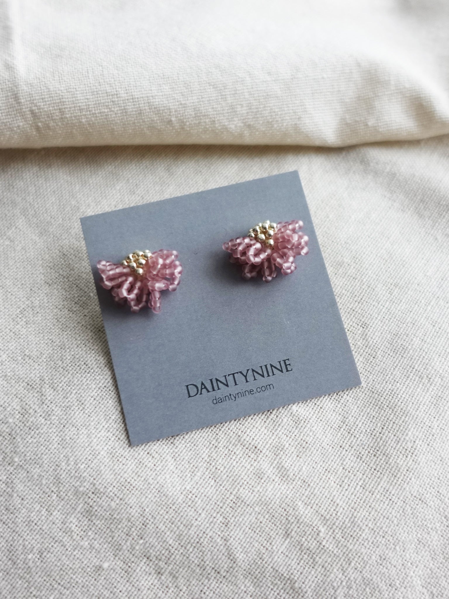 Camellia Stud Earrings in Mauve Purple Card
