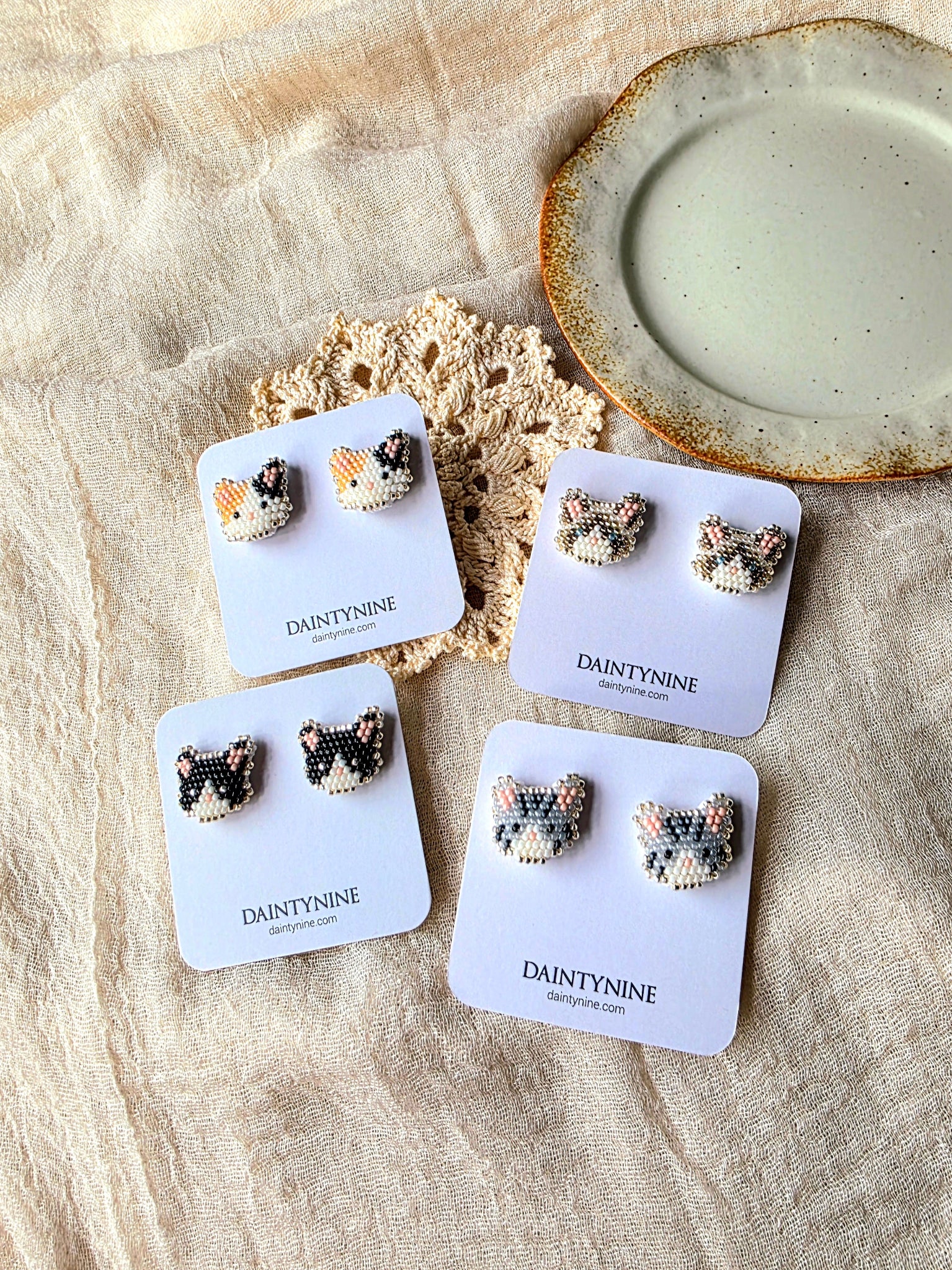 Cat stud earrings on cards group