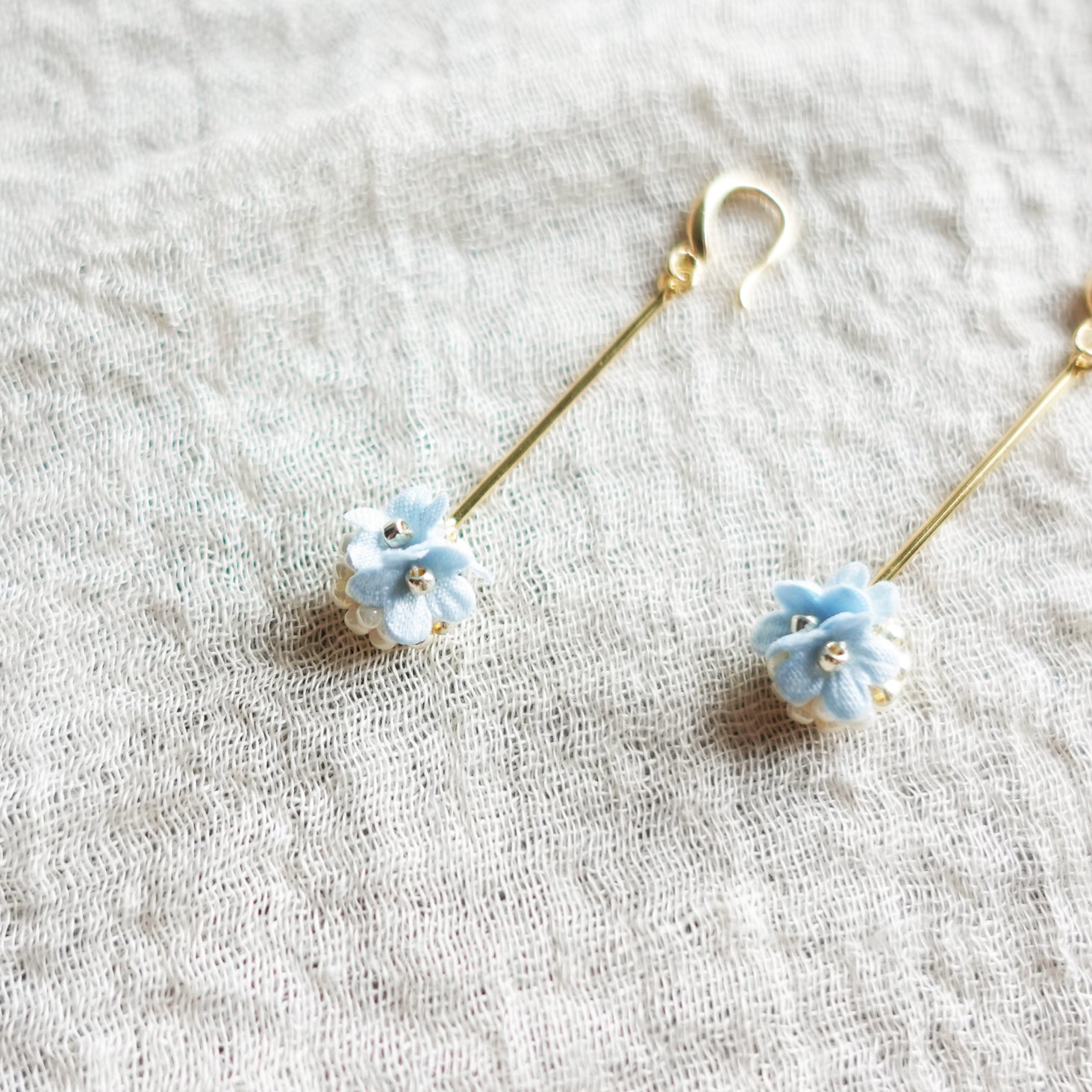 Cyme Petite Dangle Earrings in Blue Front Left