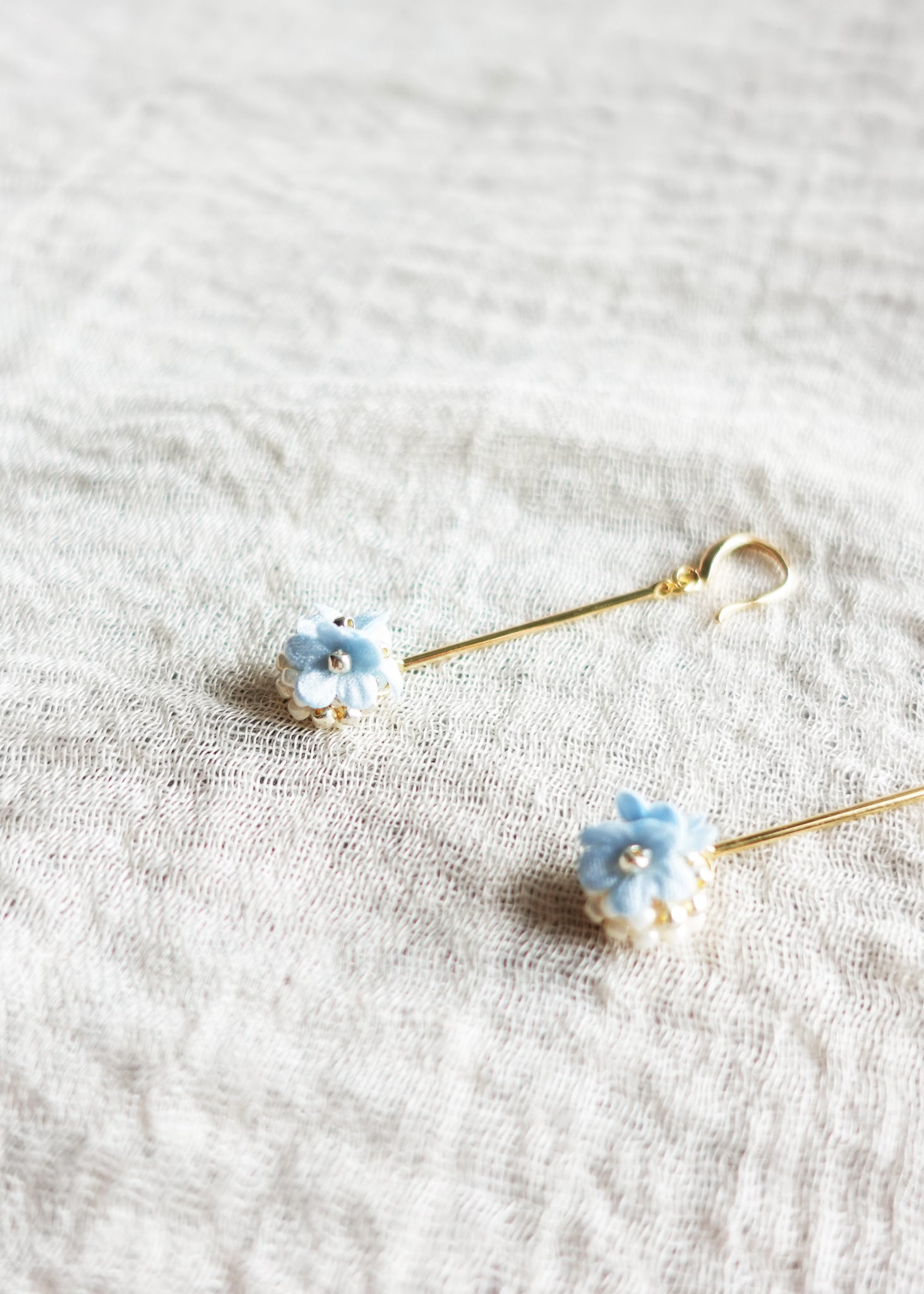 Cyme Petite Dangle Earrings in Blue Side Left