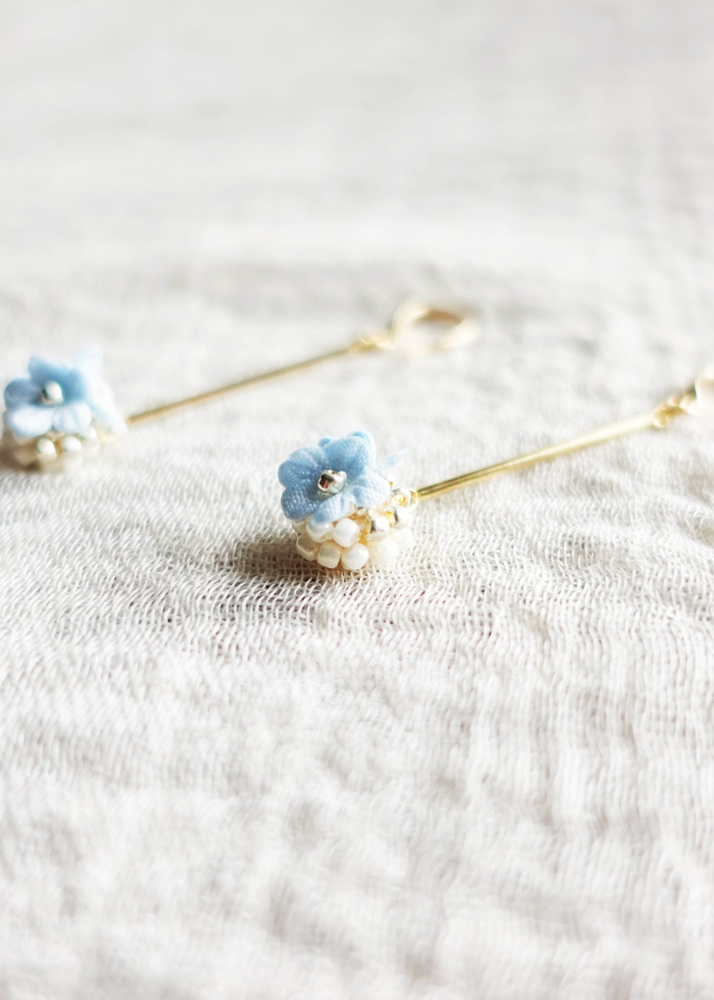 Cyme Petite Dangle Earrings in Blue Side Right Close