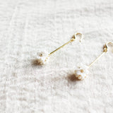 Cyme Petite Dangle Earrings in White Front