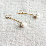 Cyme Petite Dangle Earrings in White Left Side