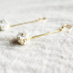 Cyme Petite Dangle Earrings in White Right Close