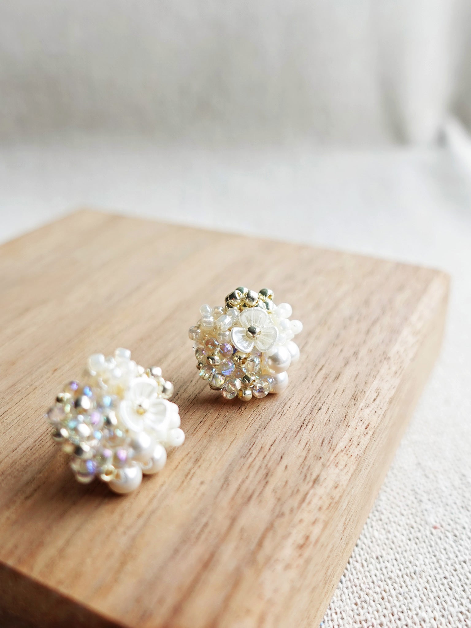 Cynthia Earrings in White Display Front