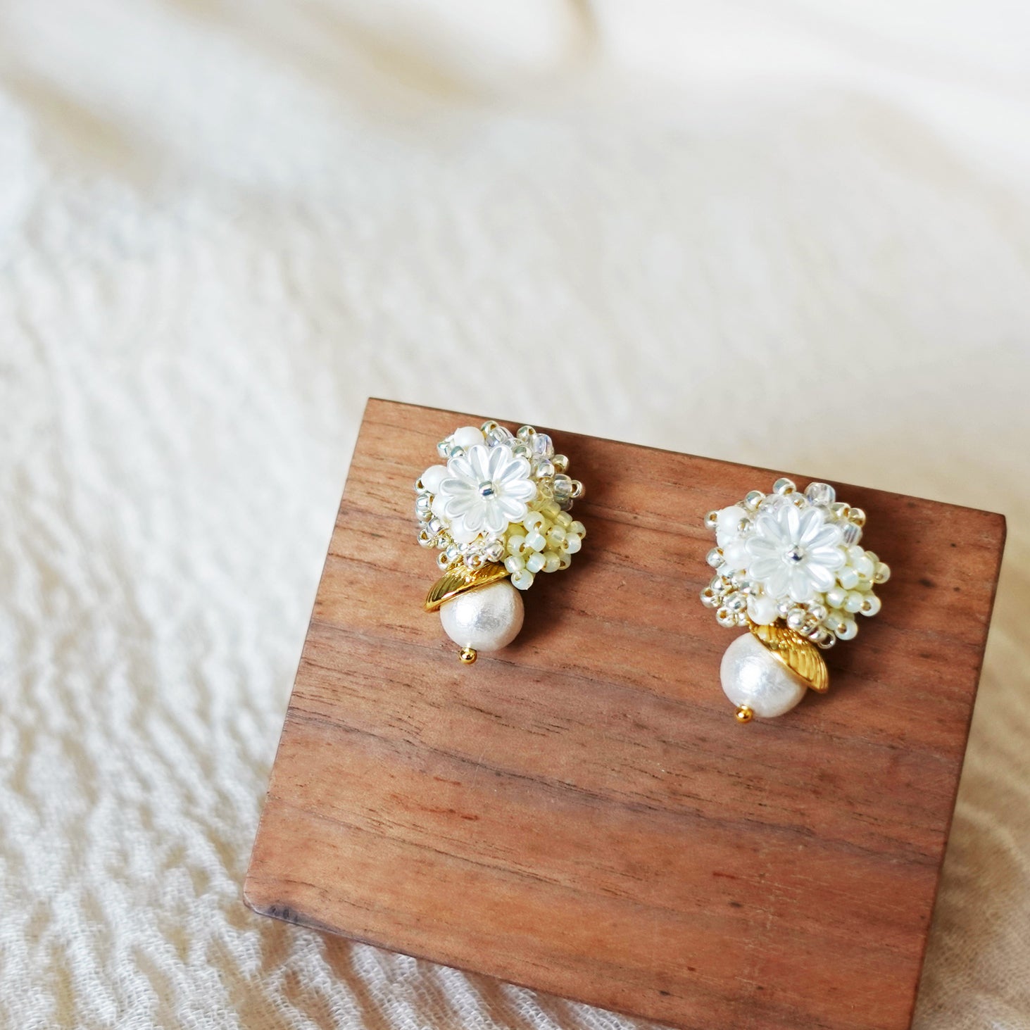 Dianelle Snowball Earrings in Yellow Front