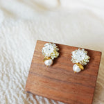 Dianelle Snowball Earrings in Yellow Front
