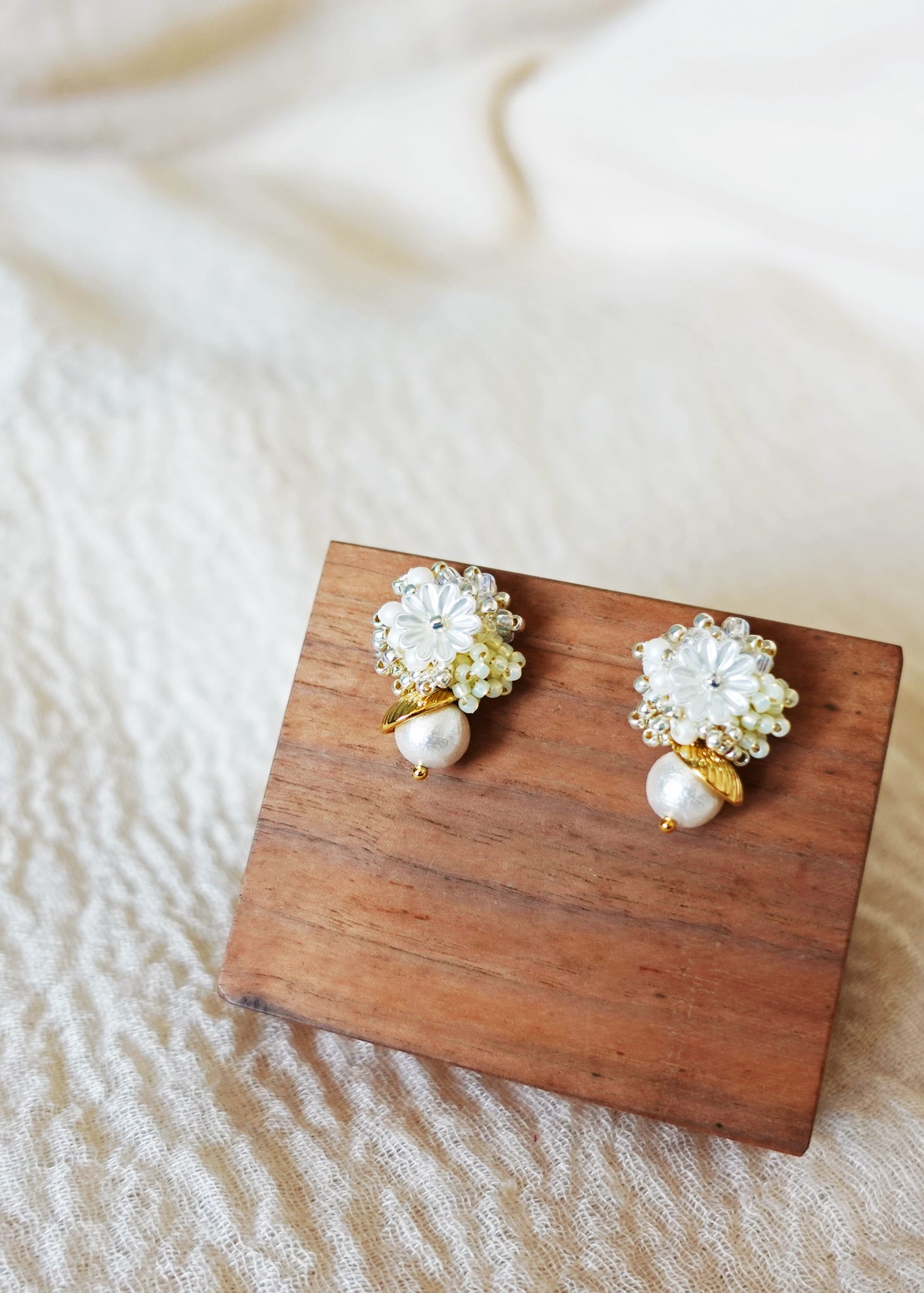 Dianelle Snowball Earrings in Yellow Front