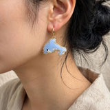 Dolphin Drop Earrings on model