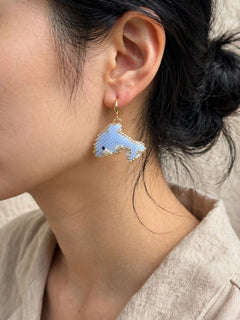 Dolphin Drop Earrings on model
