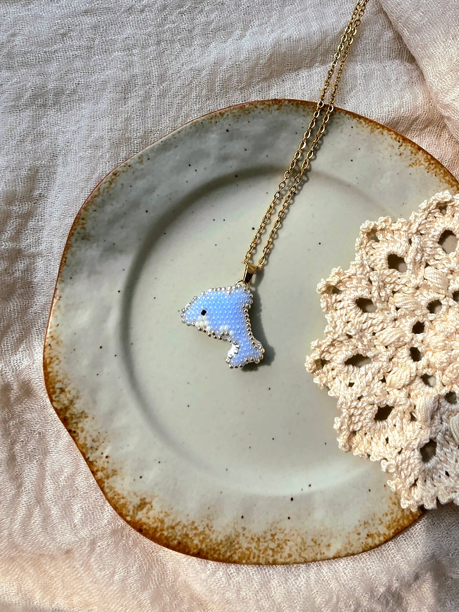 Dolphin necklace right