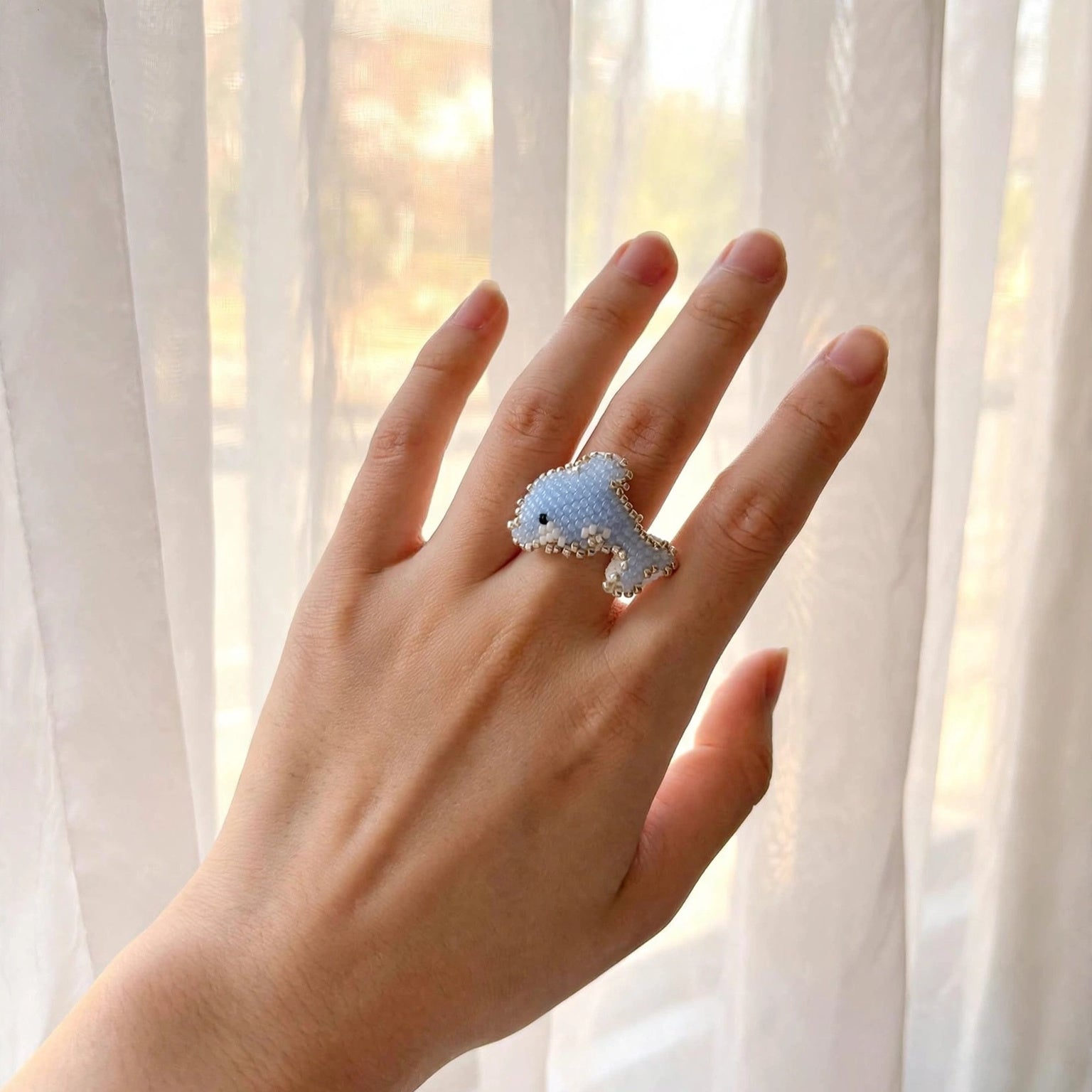 Dolphin ring on model
