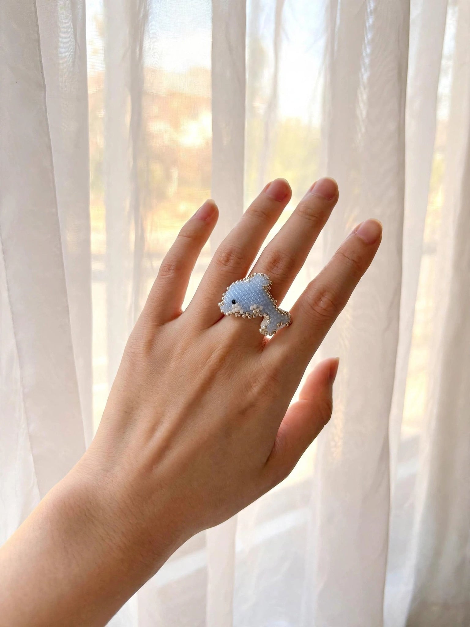 Dolphin ring on model