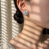Dreamtide Stud Earrings in Blue on Model