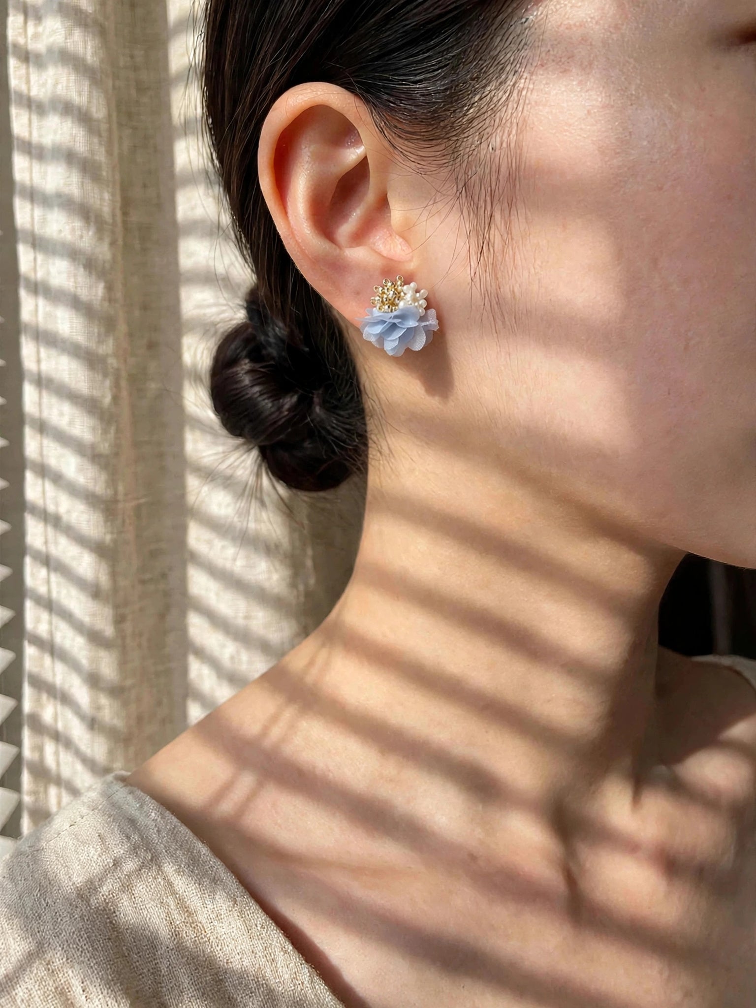 Dreamtide Stud Earrings in Blue on Model