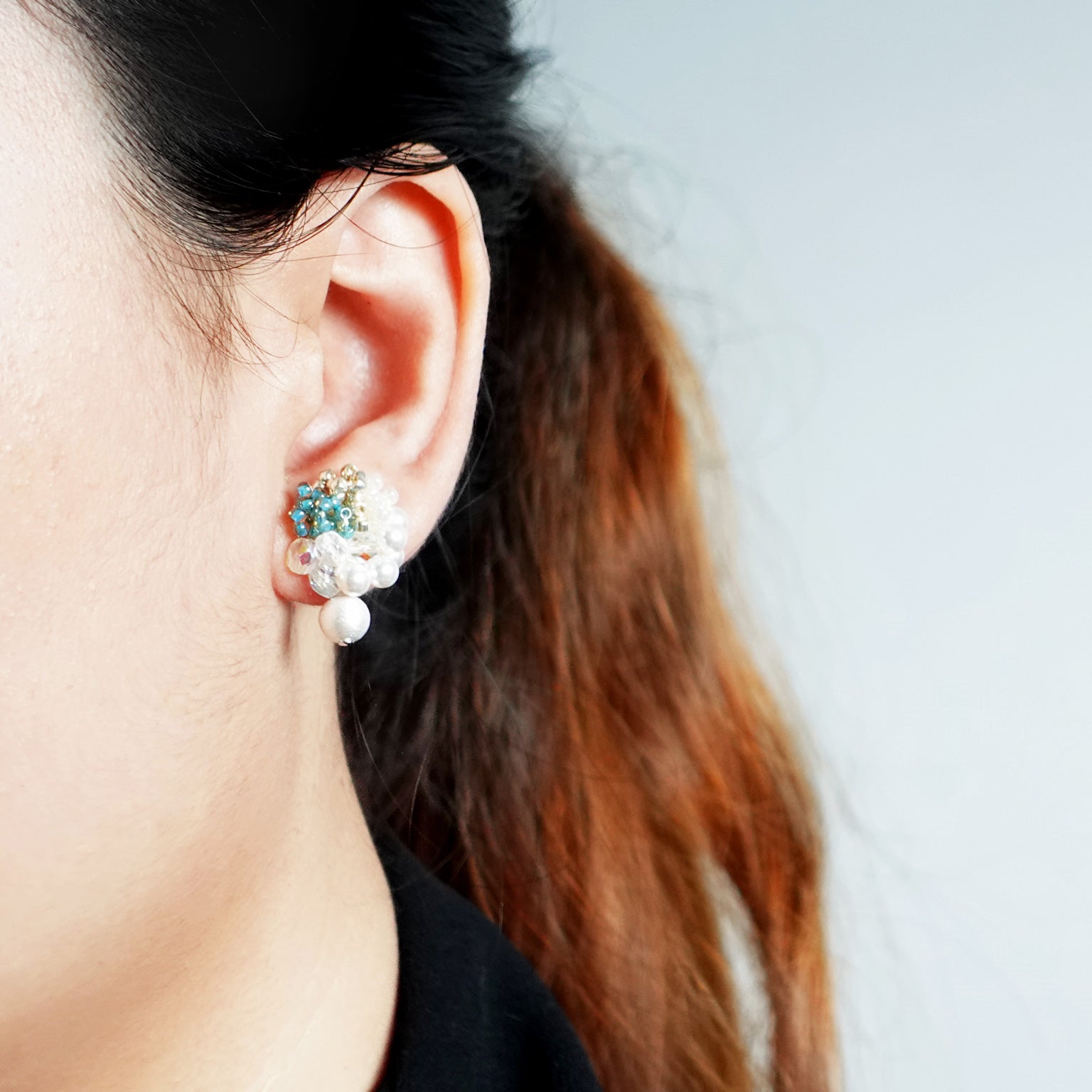 Fantasia Snowball Earrings in Ocean Green Model
