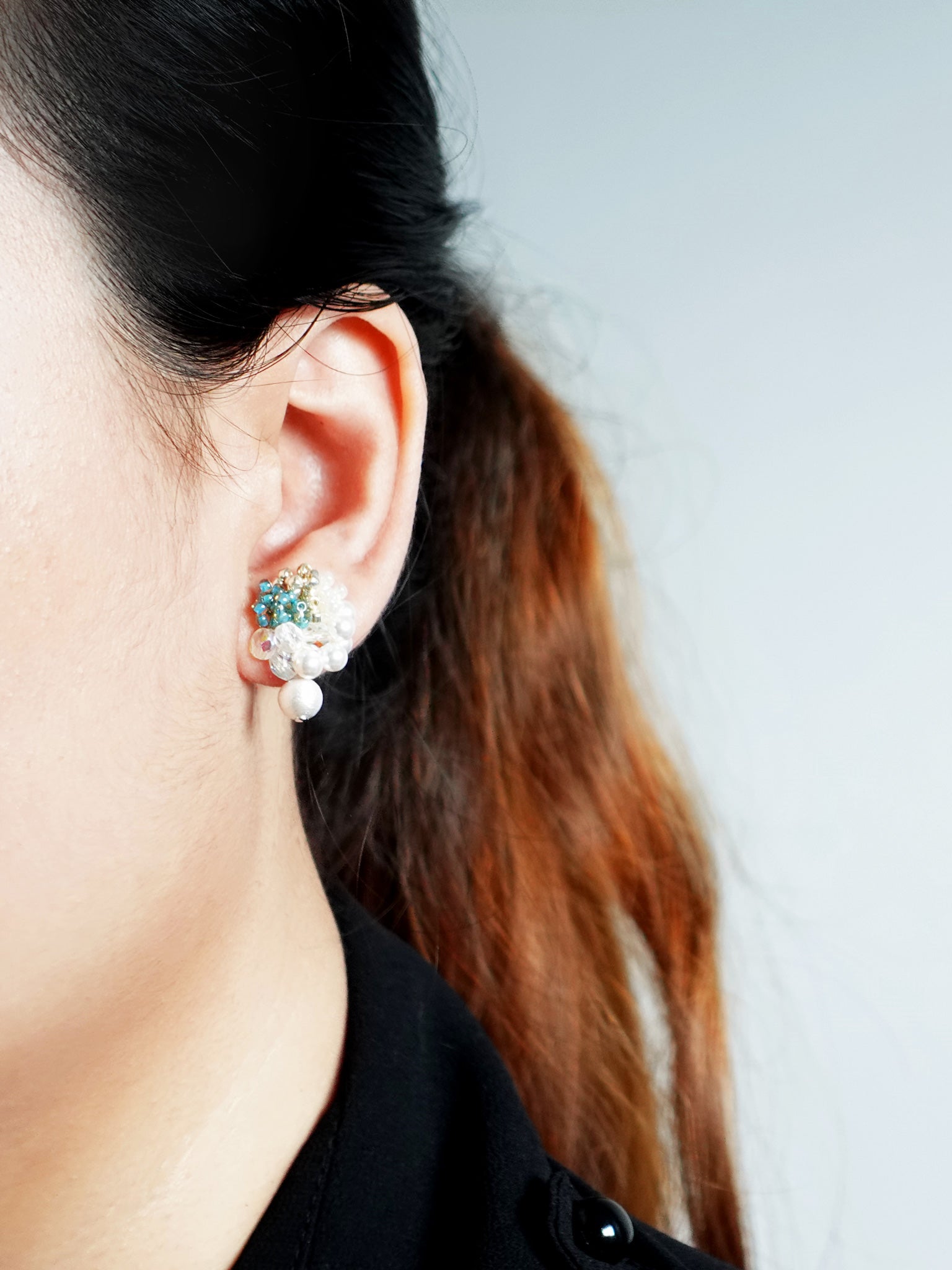 Fantasia Snowball Earrings in Ocean Green Model