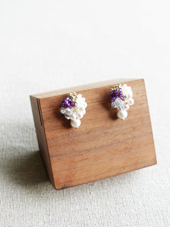 Fantasia Snowball Earrings in Royal Purple Display Left
