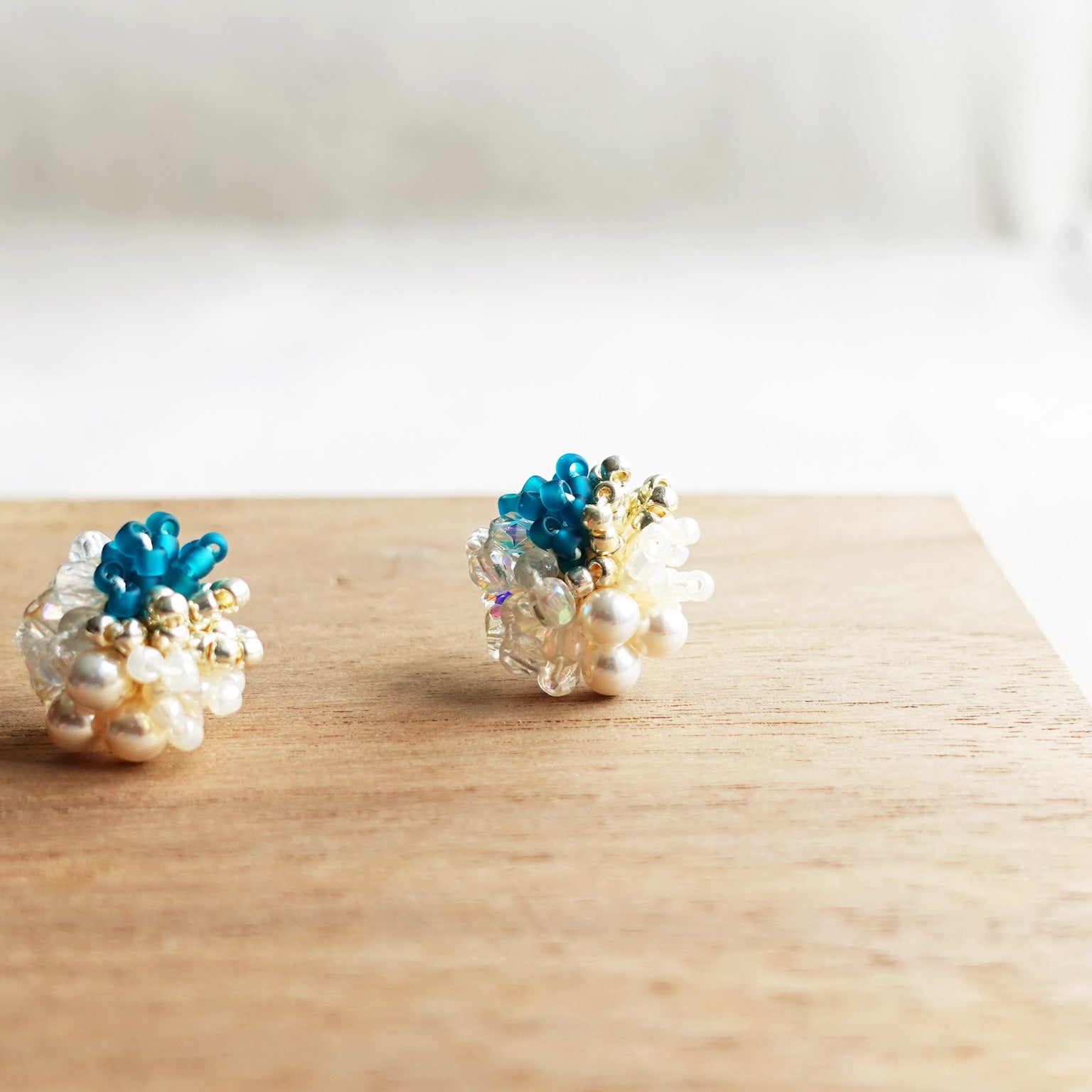 Felisia Stud Earrings in Teal Display Front